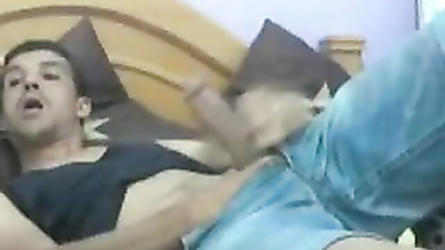 Submissive Arab twink stroking big cock on bed