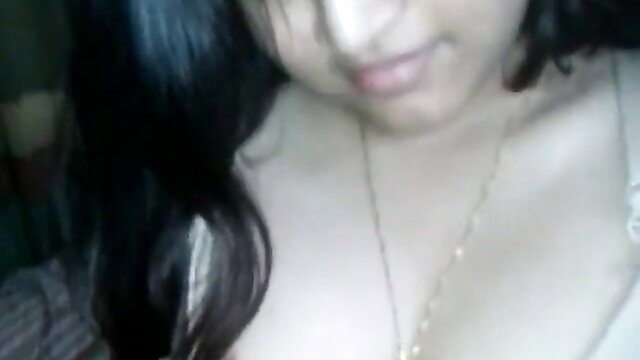 Bangladeshi Desi Girl closeup smiling in low light tease