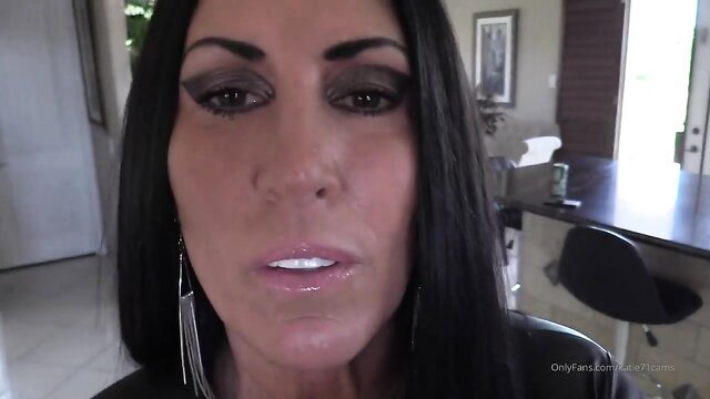 Horny mature brunette beauty in glossy lips closeup