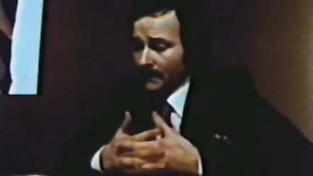 Handsome 70s suited man in intense closeup, classic XXX thumbnail