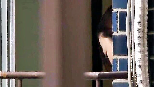 Japanese woman peeking from balcony, caught masturbating JAV thumbnail