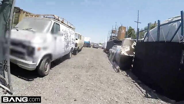Audrey Charlize white van in junkyard lot - Screw the Cops Latina