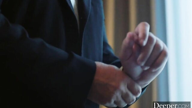 Manuel Ferrara grips Lena Paul's wrist in tense suited affair