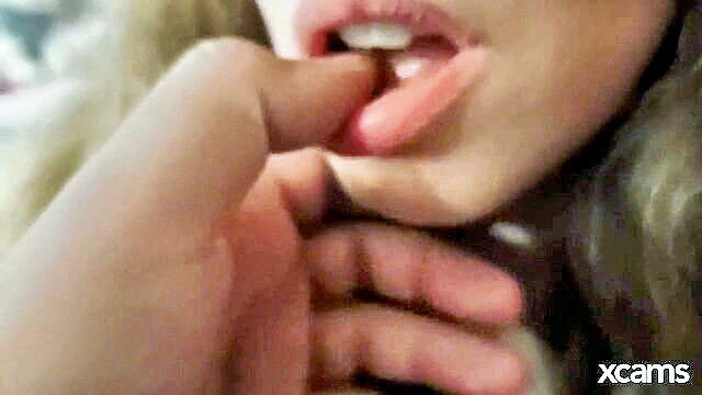 Blonde teen sucks stepdad's fingers closeup after catching him jerking to her pics