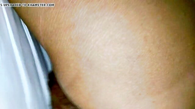 Closeup of woman's hairy ass and pussy from behind