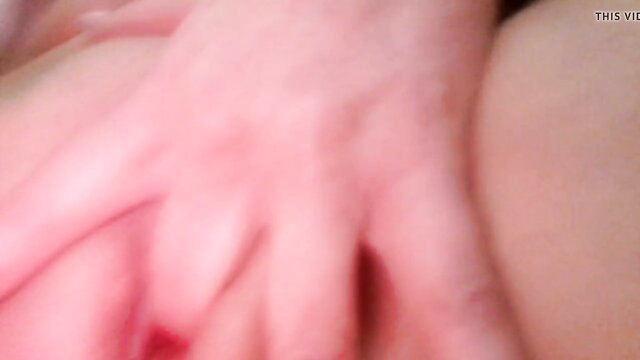 Closeup of hot mature pink pussy lips and fingers spreading