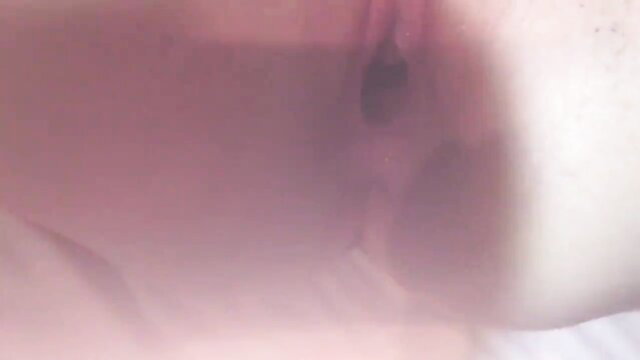 Closeup of gaping wet pussy with creampie cum dripping out