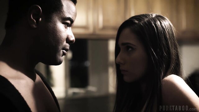 Mixed couple kitchen tension: topless black man stares at nude brunette beauty