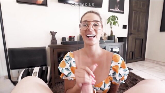 Mandy Rhea smiling in orange floral top, POV legs spread wide