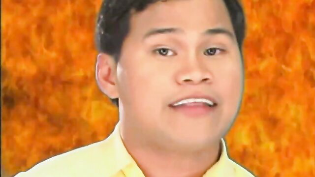 Smiling young Asian Filipino man in yellow shirt, Philippine adult cinema thumbnail