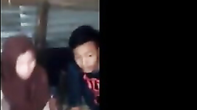 Indonesian jilbab girl spied on groped and kissed by guy