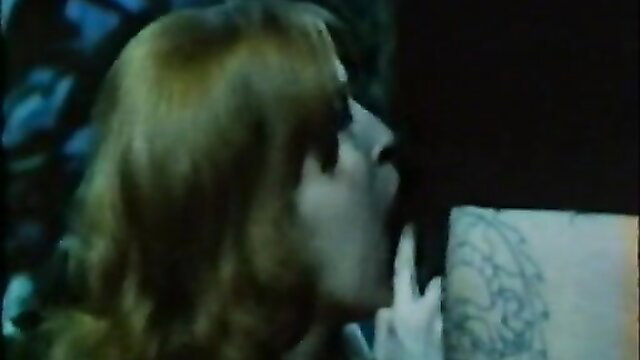 1975 retro porn babe with big lips kissing tattooed cock closeup