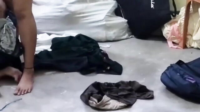 Angel Suheli nude barefoot in messy room with clothes scattered