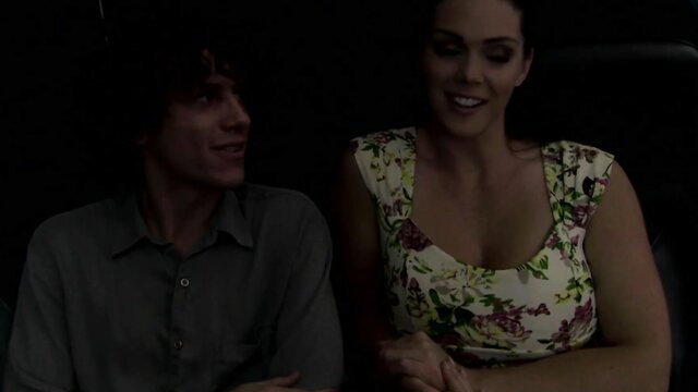 Alison Tyler in tight floral dress, intimate eye contact with man
