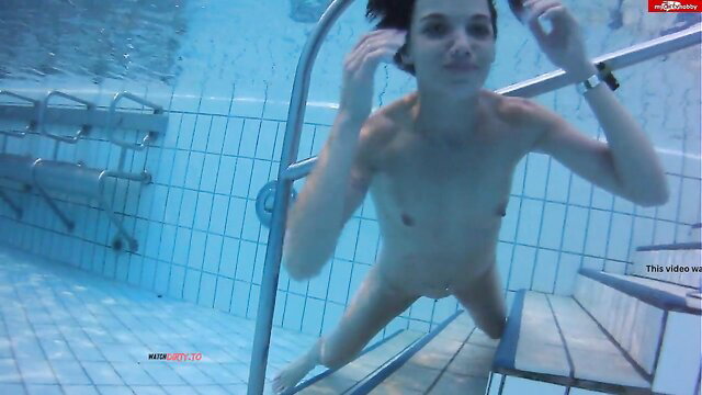 HornyRoxy naked underwater in public pool, nude swim tease
