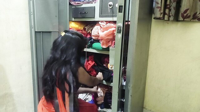 Desi Mumbai Ashu maid in orange saree rummaging wardrobe, hot curves
