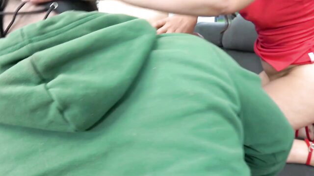 Femdom pegging sissy in green hoodie with red top dominatrix