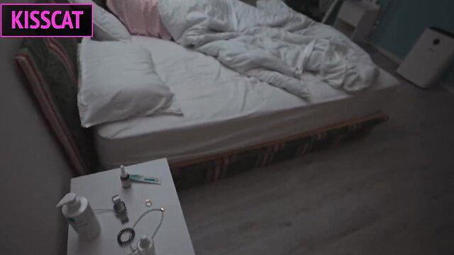 Hot wife in pink lingerie on messy bed, medical toys hint handjob tease