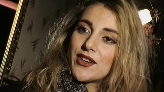 Selen closeup in More Than An Autograph, blonde beauty with bold lips