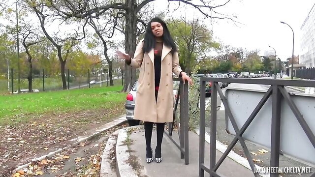 French ebony Haneul in trench coat and stockings outdoor casting