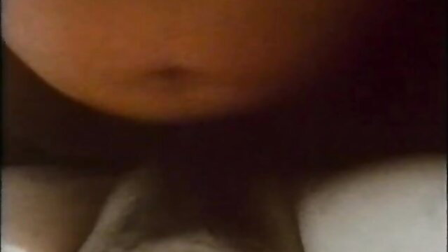 Vintage Tabu Film closeup of woman's large bare breasts and cleavage