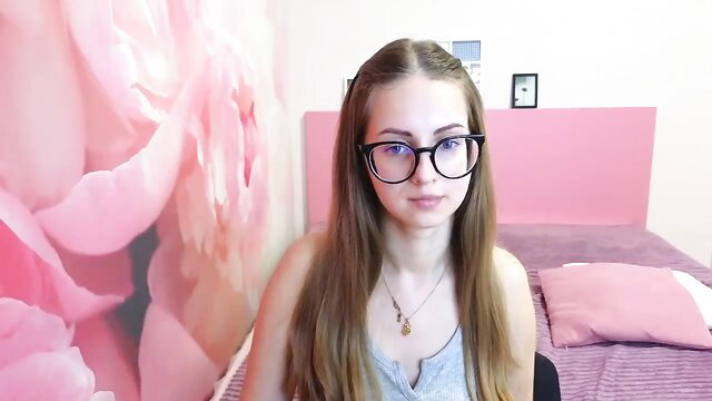 Kristina_Adel on MyFreeCams, cute teen with glasses in pink room