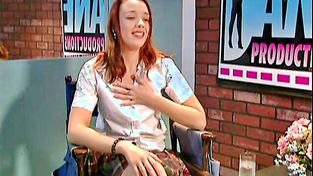 Olivia Saint redhead smiling in blouse skirt on Babe Stars set