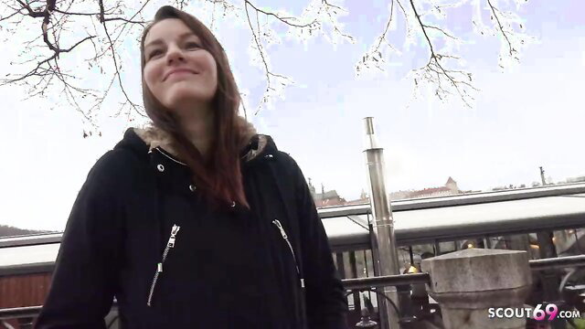 Elena Vega smiling shyly outdoors in black hoodie, German Scout teen