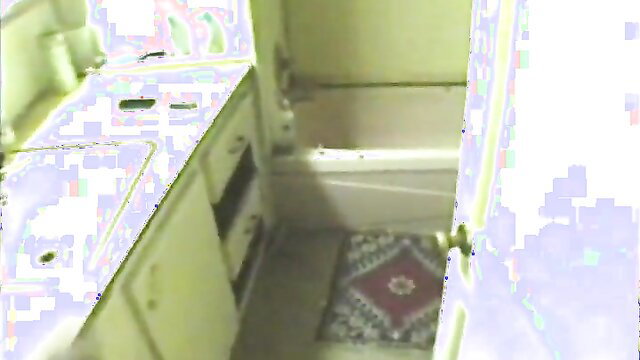 Ghetto crack whore in bathroom, yellow kitchen backdrop