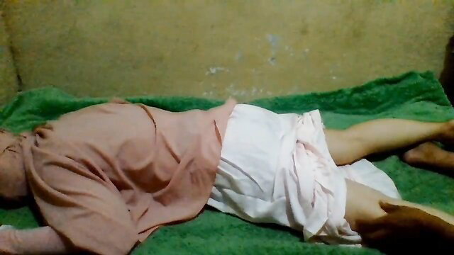 Angelina Pop maid in pink skirt massaged fully body on green bed