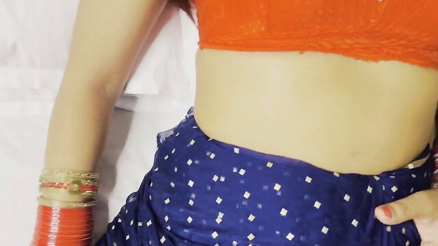 Indian bhabhi Mahi in orange blouse blue skirt, sexy navel pose