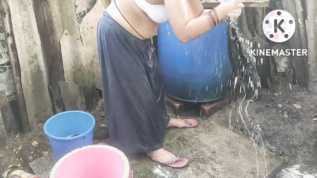 Hot Indian housewife bhabhi washing clothes in saree skirt wet look