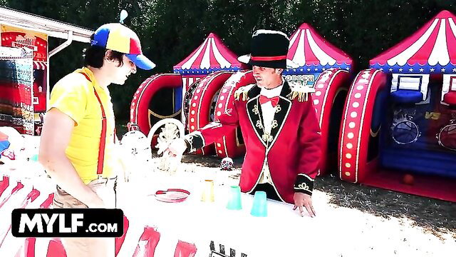 Bella Rolland as strong MILF in carnival clown outfit at fair