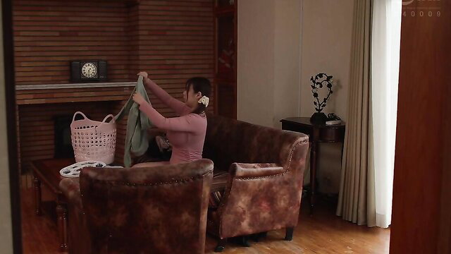 Shiori Tsukada folding laundry in tight pink top, busty Asian wife