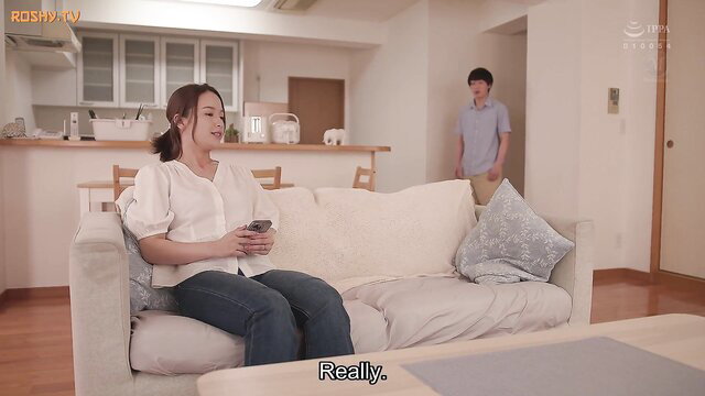 AI Mukai in white blouse and jeans on couch, secretly eyeing stepbro in JAV