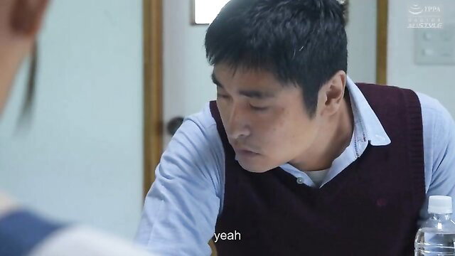 Asian man in vest and shirt gazes intently in Cuckold Mansion No.7 JAV scene