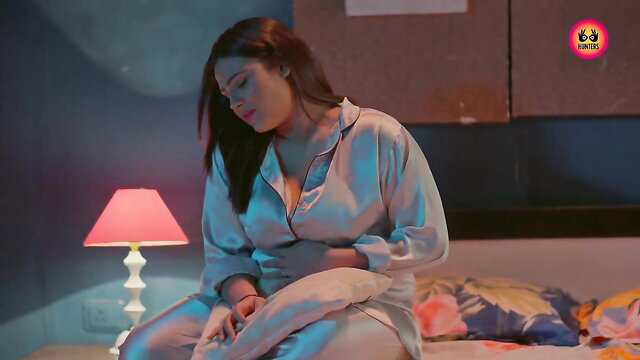 Indian desi babe in silky satin nightie on bed, softcore tease