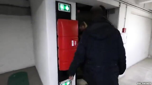 Hotwife cheating in cellar, man in hoodie opens red cabinet