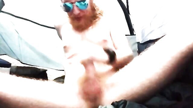 Bearded nudist with ginger hair masturbates in tent POV