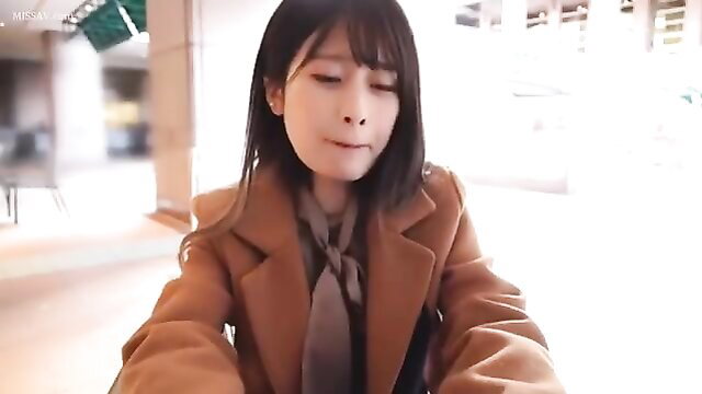 Asian beauty in brown coat and scarf, closeup smile in public