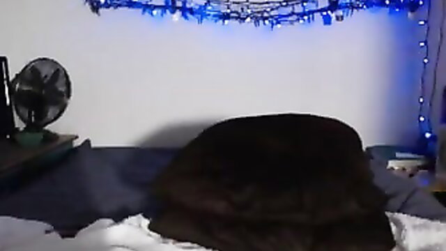 Pregnant curly long-haired nympho on bed fucking dildo