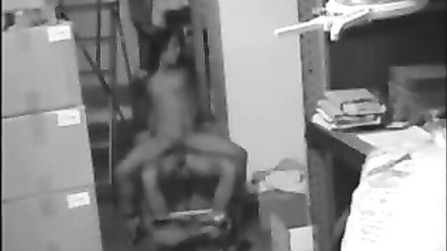 Blurry CCTV of brunette secretary riding coworker cock at work