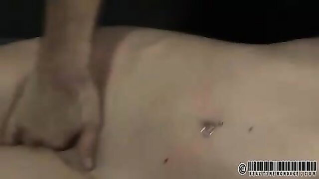 Redhead mommy hogtied nude on floor, master gropes her pierced pussy