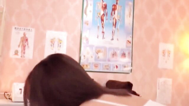 Young Japanese teen bent over exam table for dirty old guy