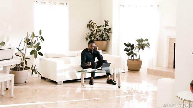 Handsome black man in stylish living room, I Have A Wife scene