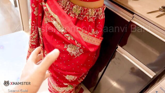 Saanvi Bahl in red embroidered saree, curvy Indian bhabhi kitchen tease