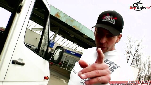 Blonde amateur babe points seductively at gas station in white tee