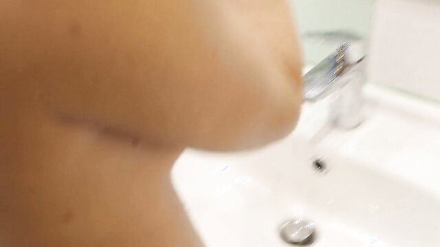 AnnaHomeMix naked at sink, brushing teeth, huge tits closeup