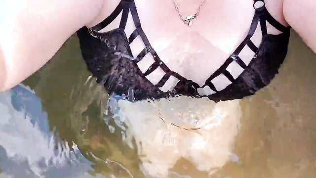 Busty BBW in wet black lace bra, bouncy tits in water