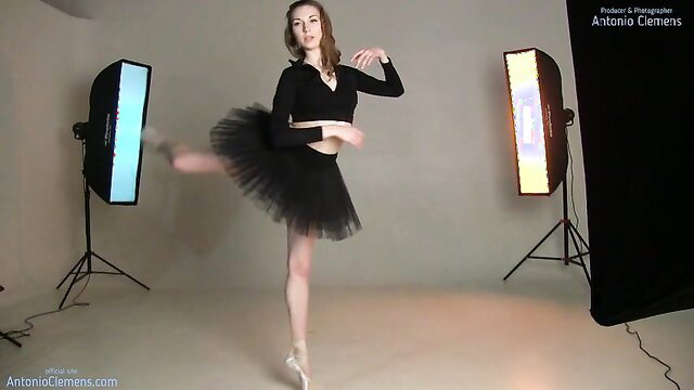 Flexible ballerina Annett A poses in black tutu, flawless body